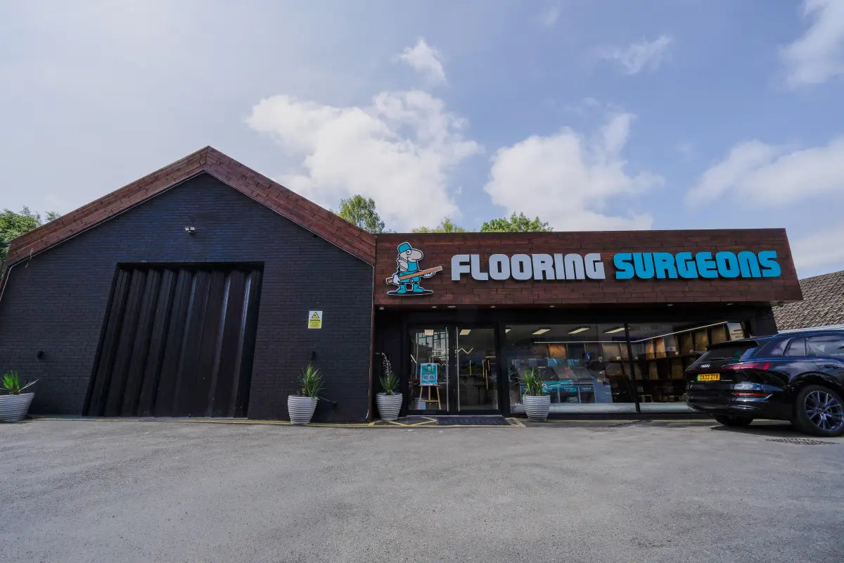 Flooring Surgeons showroom storefront by day