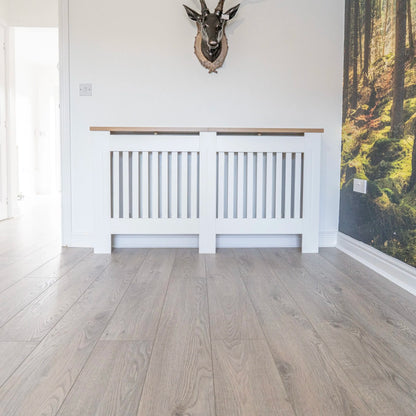 Porcini Oak 12mm Laminate – laid in a living room