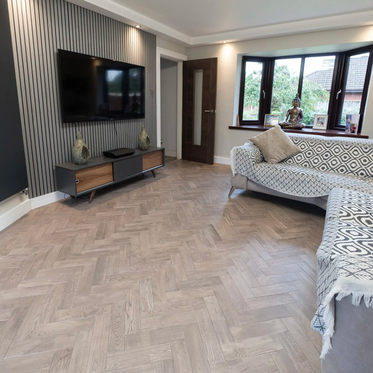 Sterling Silver Oak 80mm Engineered Herringbone – laid in a living room