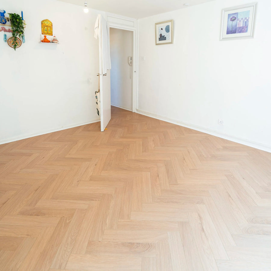 Sunset Oak Herringbone 12mm Laminate – image 1