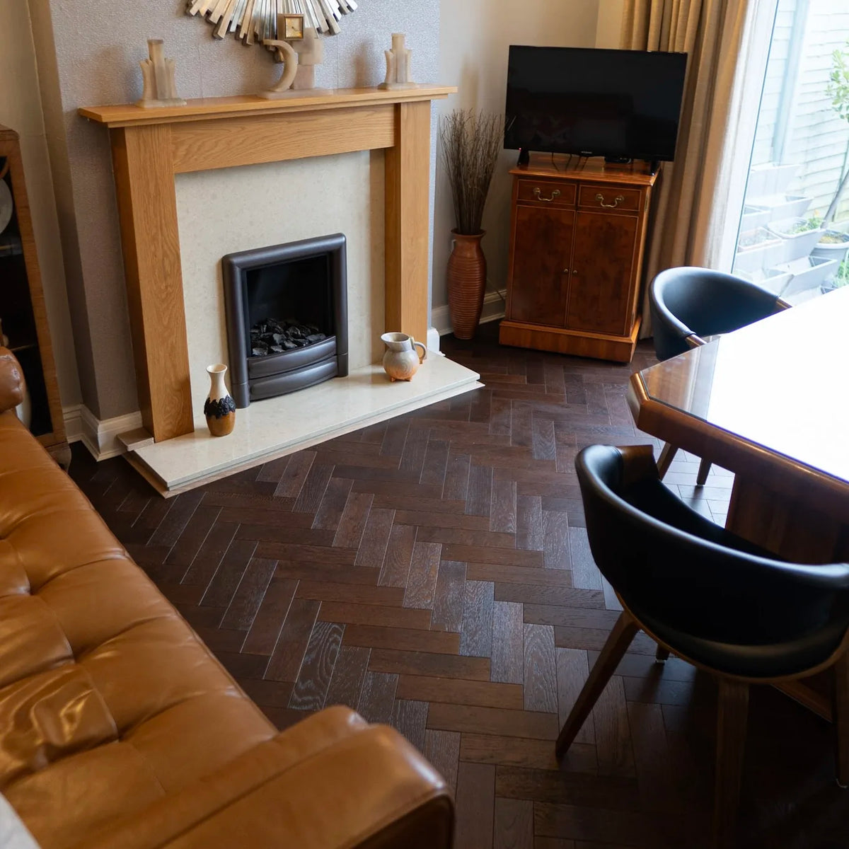Dark Chocolate Oak 80mm Engineered Herringbone – laid in a dining room