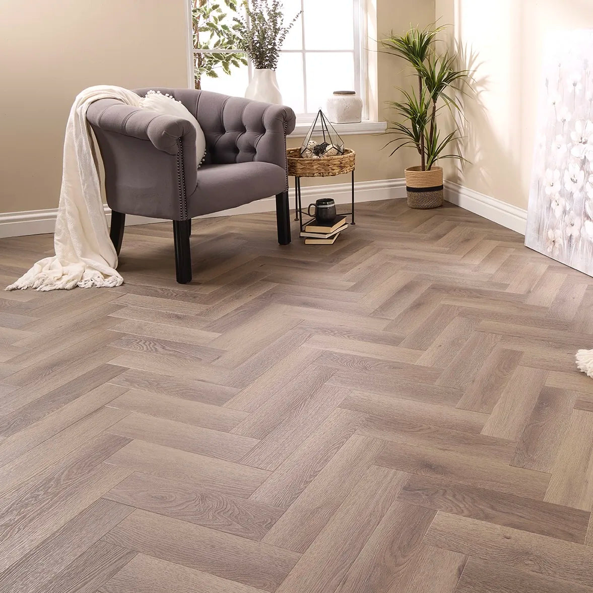 Aragon Oak Herringbone Glue Down LVT – laid in a living room