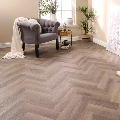 Aragon Oak Herringbone Glue Down LVT – laid in a living room