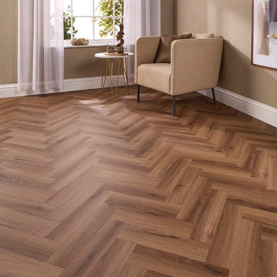 Castile Oak Herringbone Glue Down LVT – laid in a living room