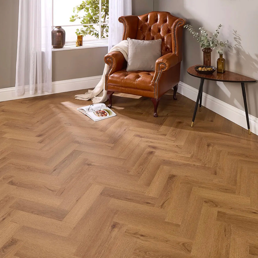 Granada Oak Herringbone Glue Down LVT – laid in a living room