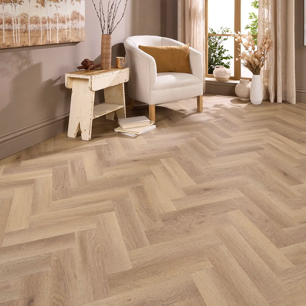 Marbella Oak Herringbone Glue Down LVT – laid in a living room