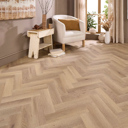 Marbella Oak Herringbone Glue Down LVT – laid in a living room