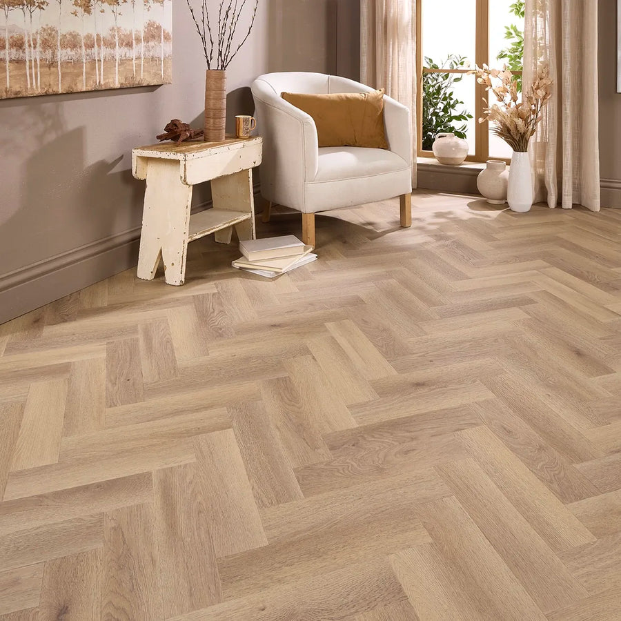 Marbella Oak Herringbone Glue Down LVT – laid in a living room