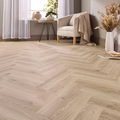 Toledo Oak Herringbone Glue Down LVT – laid in a living room