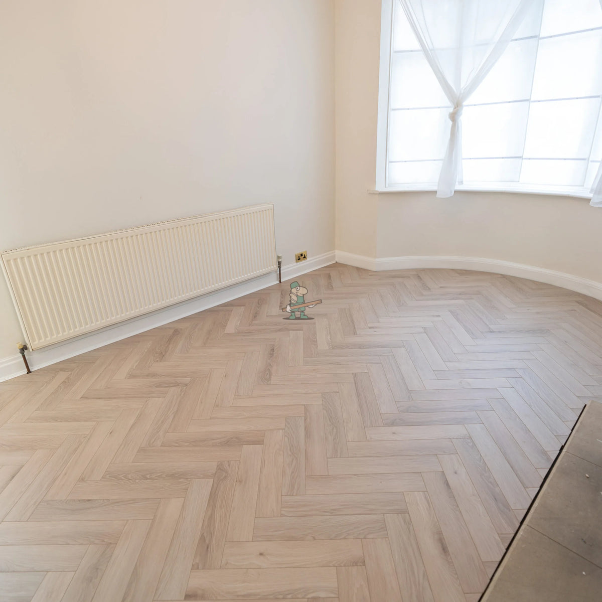 Glacier Oak Herringbone 12mm Laminate – room setting (2)