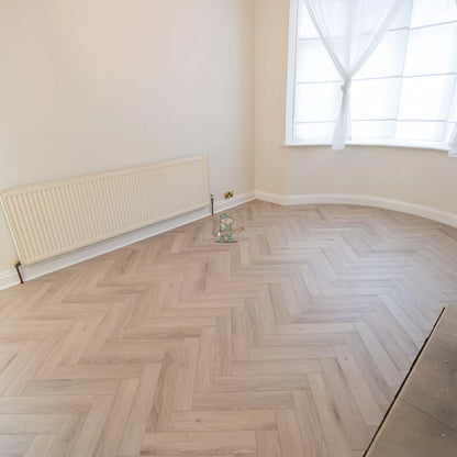 Glacier Oak Herringbone 12mm Laminate – room setting (2)