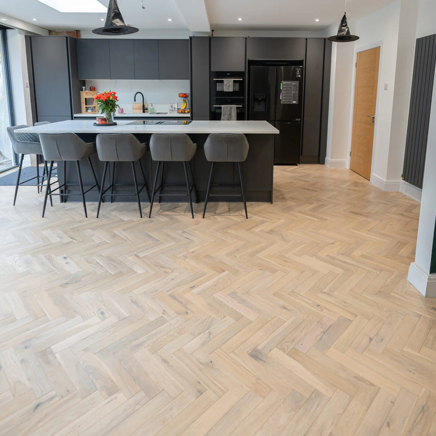 Worn Cathedral Oak 70mm Engineered Herringbone – laid in a kitchen