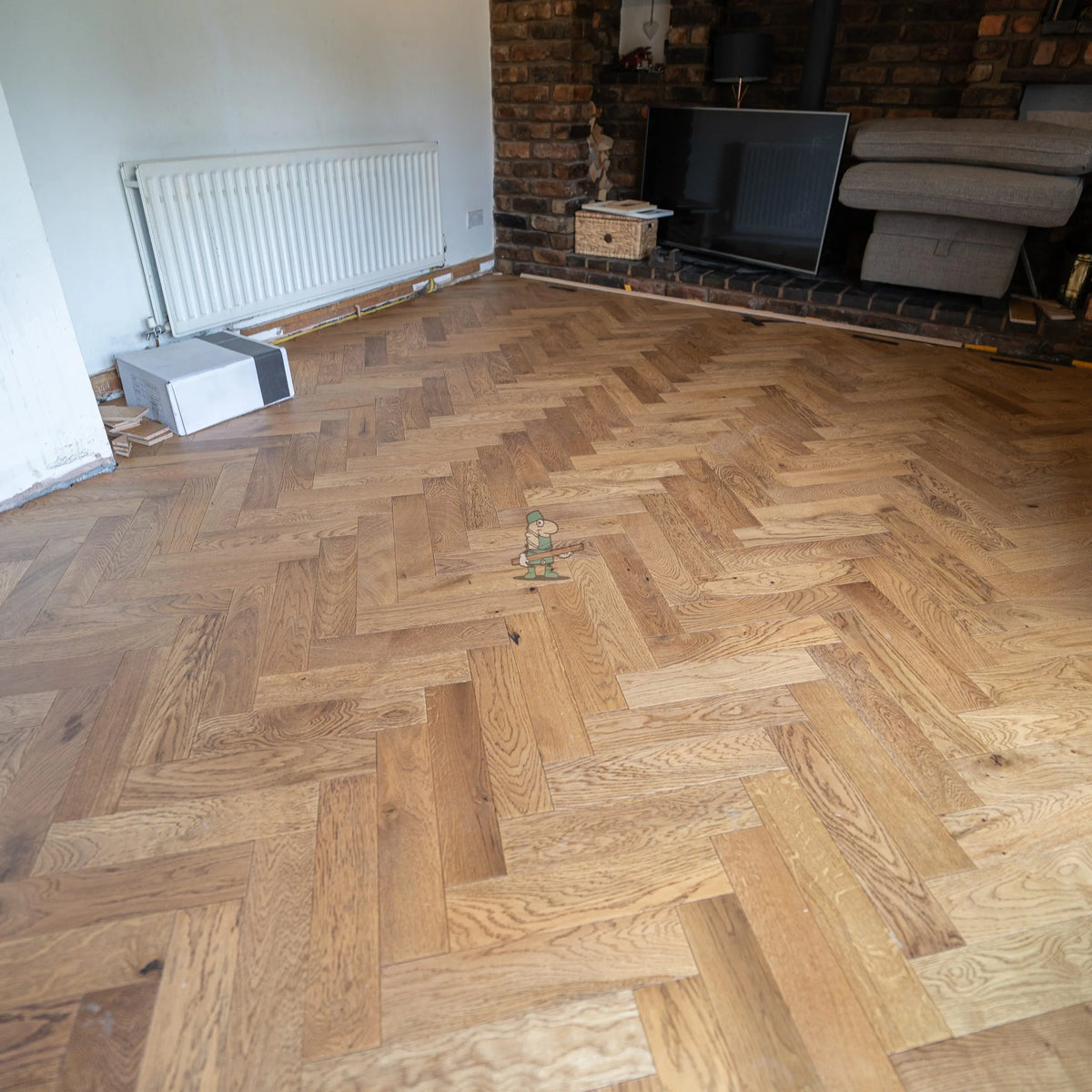 Cottage Oak 90mm Engineered Herringbone – laid in a living room (2)