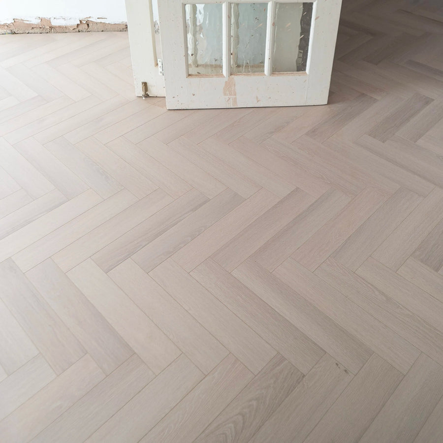 Coral Oak Herringbone 12mm Laminate – image 1