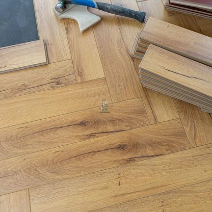 Embossed Natural Oak Herringbone 12mm Laminate – image 6