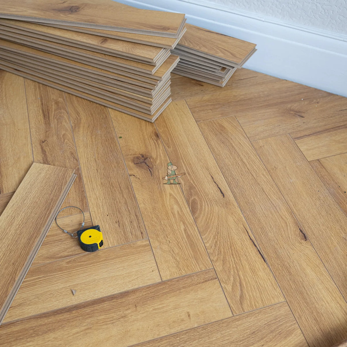 Embossed Natural Oak Herringbone 12mm Laminate – image 7