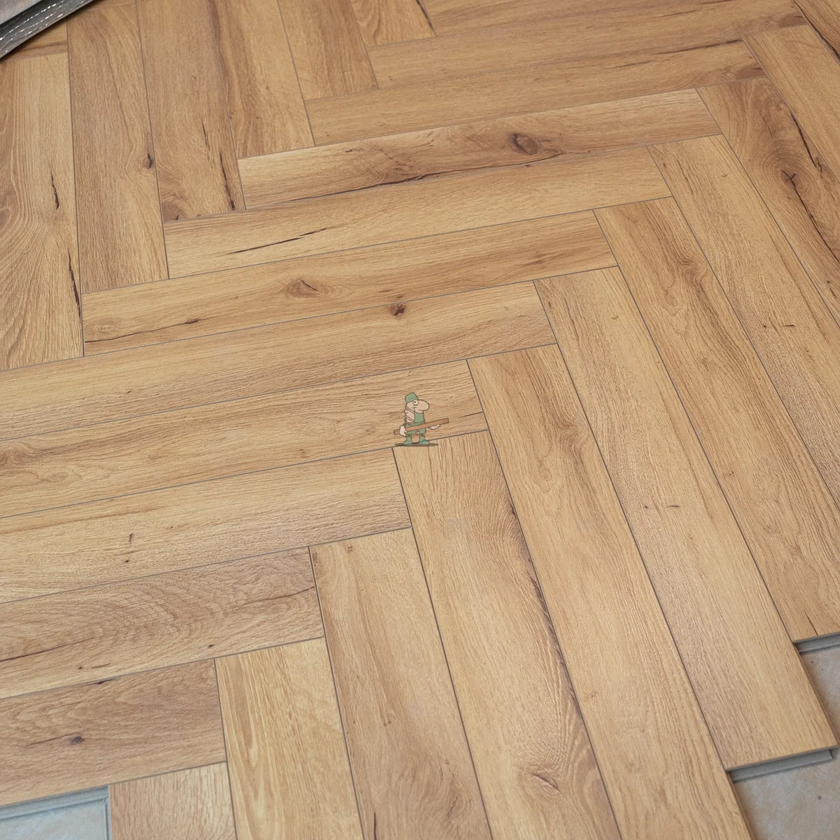 Embossed Natural Oak Herringbone 12mm Laminate – image 2