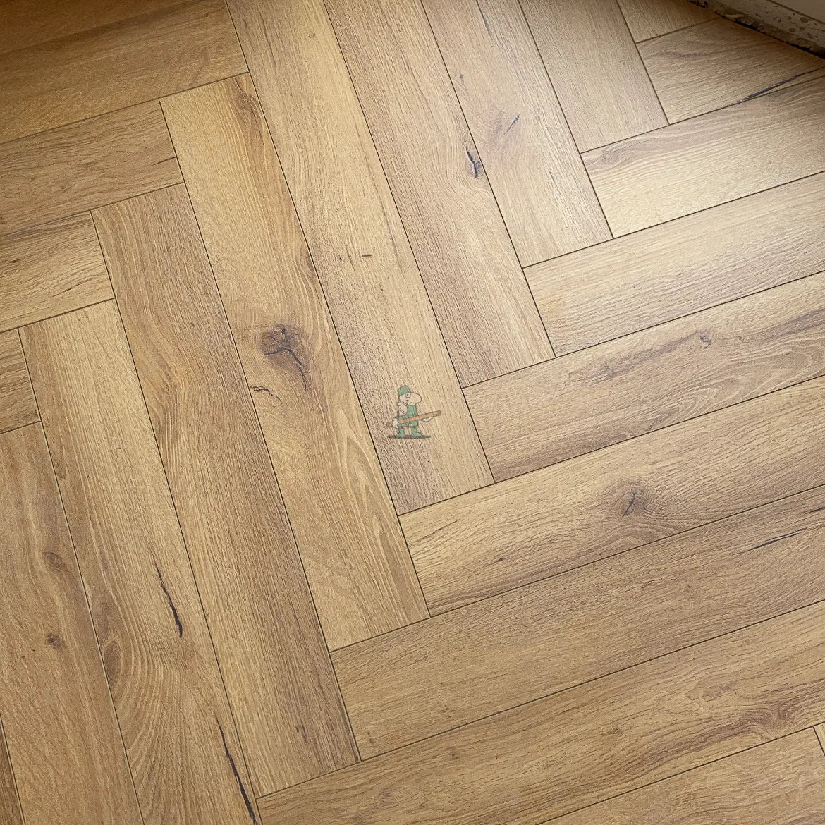 Embossed Natural Oak Herringbone 12mm Laminate – image 8