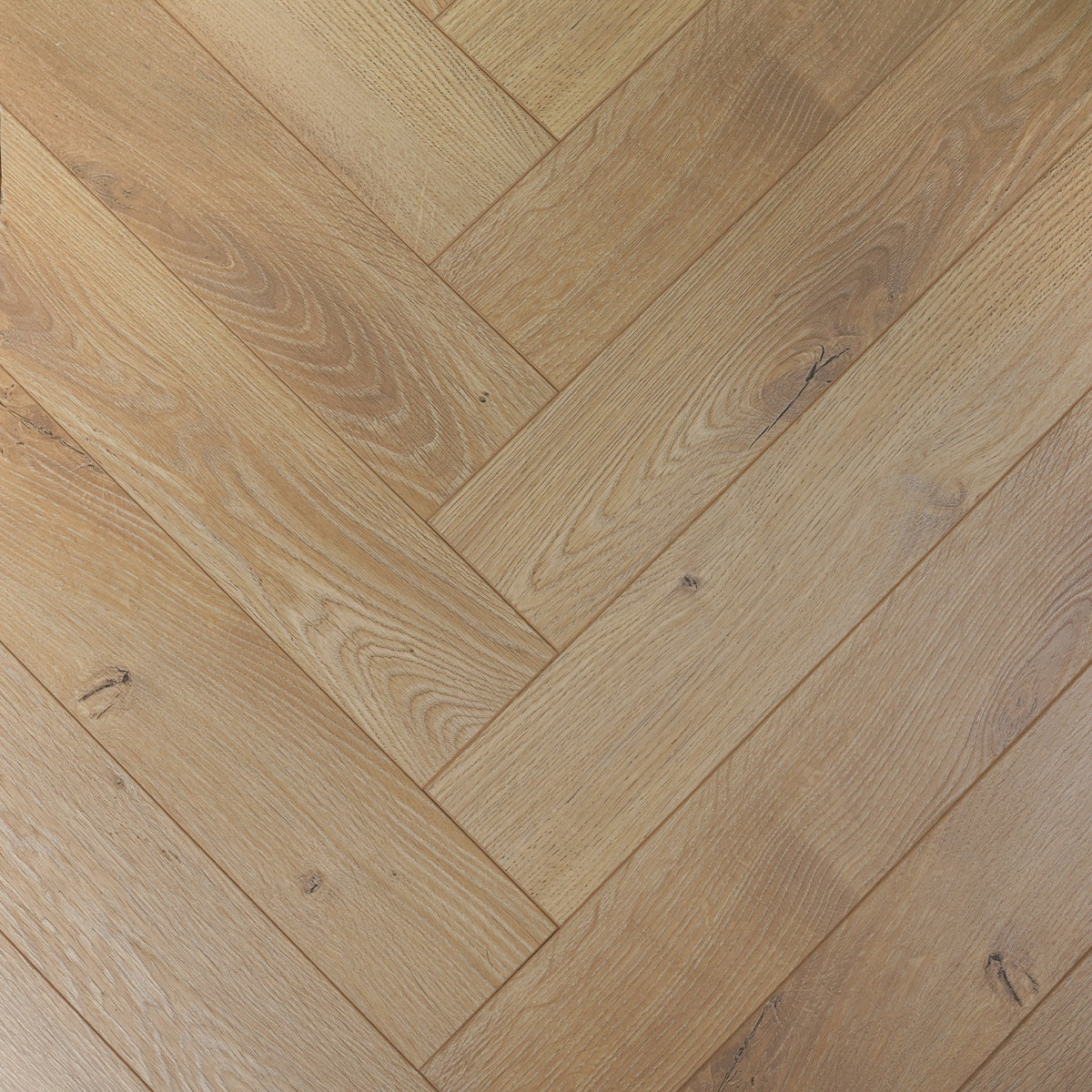 Light Brown Oak Herringbone 12mm Laminate – image 1