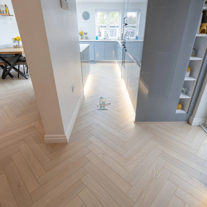 Savannah Oak Herringbone 12mm Laminate – laid in a kitchen (2)