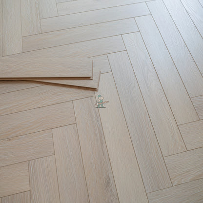 Savannah Oak Herringbone 12mm Laminate – close-up of the surface
