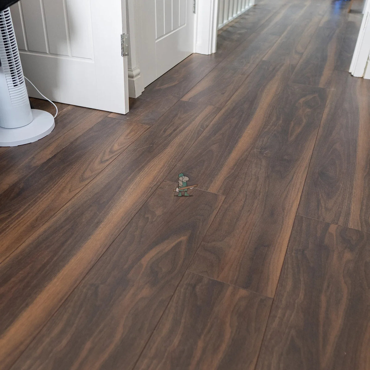 Dark American Walnut 12mm Laminate – laid in a hallway