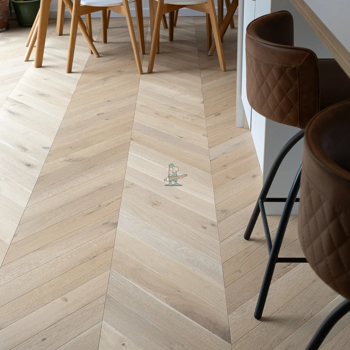 Cotton Invisible Oak 90mm Engineered Chevron – laid in a kitchen