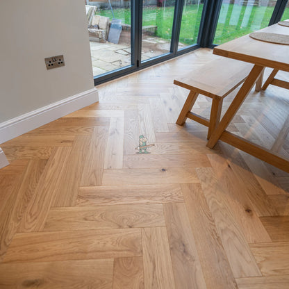 Natural Oak 125mm Engineered Herringbone – laid in a dining room (2)