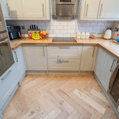 Natural Oak 125mm Engineered Herringbone – laid in a kitchen