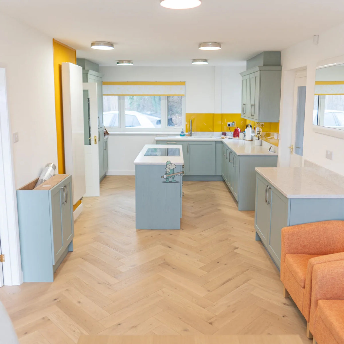 Pale Invisible Oak 125mm Engineered Herringbone – laid in a kitchen