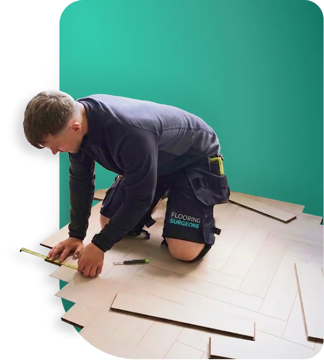 Flooring Surgeons fitter laying a wood floor