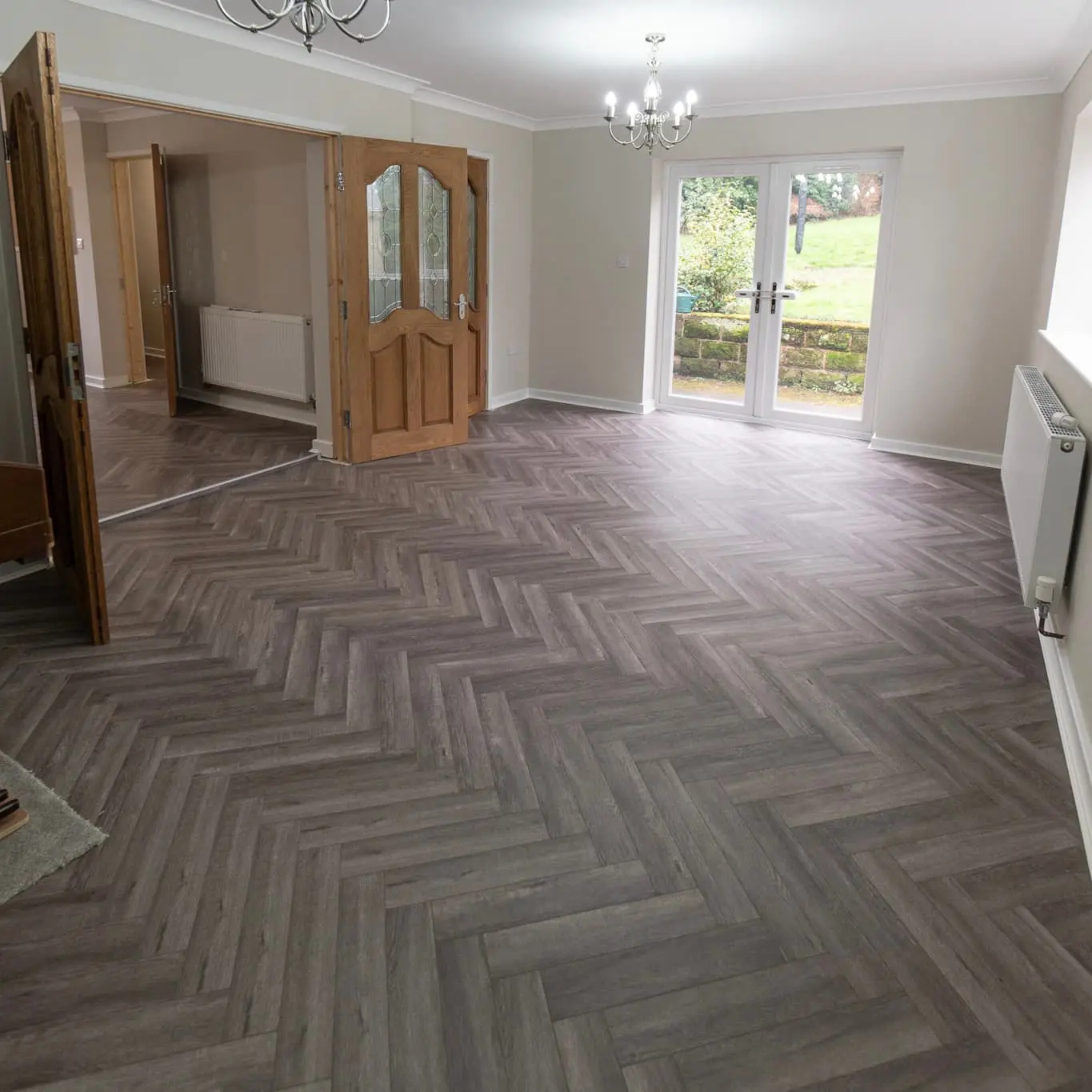 Craft 12mm Cosmic Grey Oak Herringbone AC5 Laminate Flooring