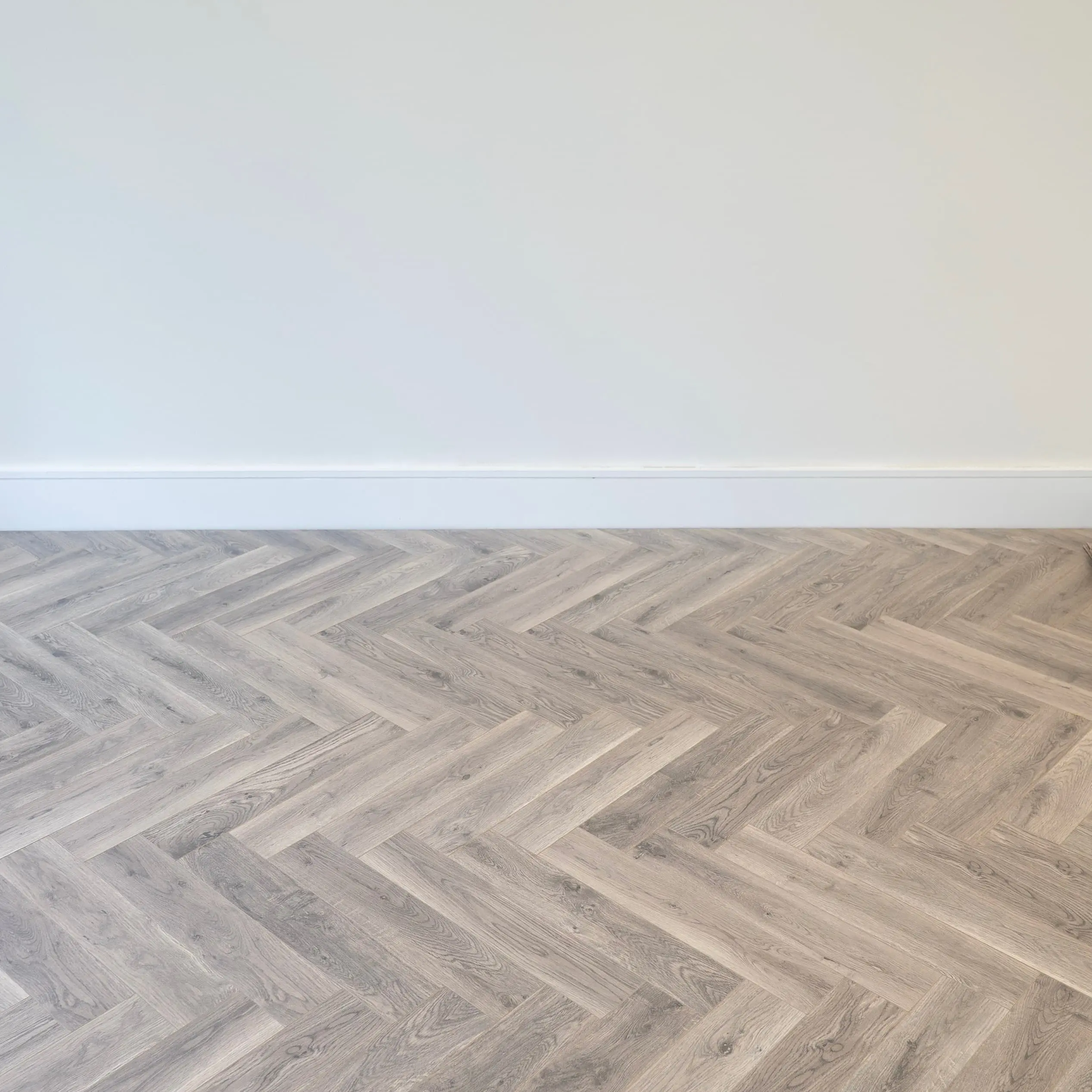 Oak Herringbone Laminate Flooring in Living Room