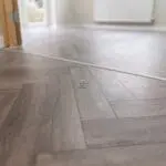 Craft 12mm Cosmic Grey Oak Herringbone AC5 Laminate Flooring