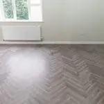 Craft 12mm Cosmic Grey Oak Herringbone AC5 Laminate Flooring