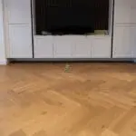 Riviera Click 14/3 x 150mm Caramel Oak Herringbone Engineered Wood Flooring in Dining Room (YHB1402C)