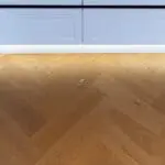 Riviera Click 14/3 x 150mm Caramel Oak Herringbone Engineered Wood Flooring in Dining Room (YHB1402C)