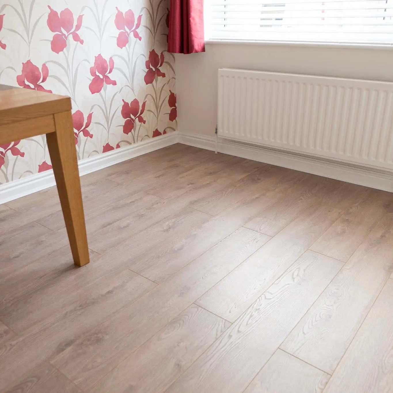 Cambridge 12mm Nude Oak AC5 Laminate Flooring in Living Room