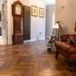 Riviera 14/3 x 90mm Double Smoked Oak Herringbone Engineered Wood Flooring in Living Room