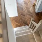 Riviera 14/3 x 90mm Double Smoked Oak Herringbone Engineered Wood Flooring in Living Room