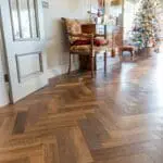Riviera 14/3 x 90mm Double Smoked Oak Herringbone Engineered Wood Flooring in Living Room