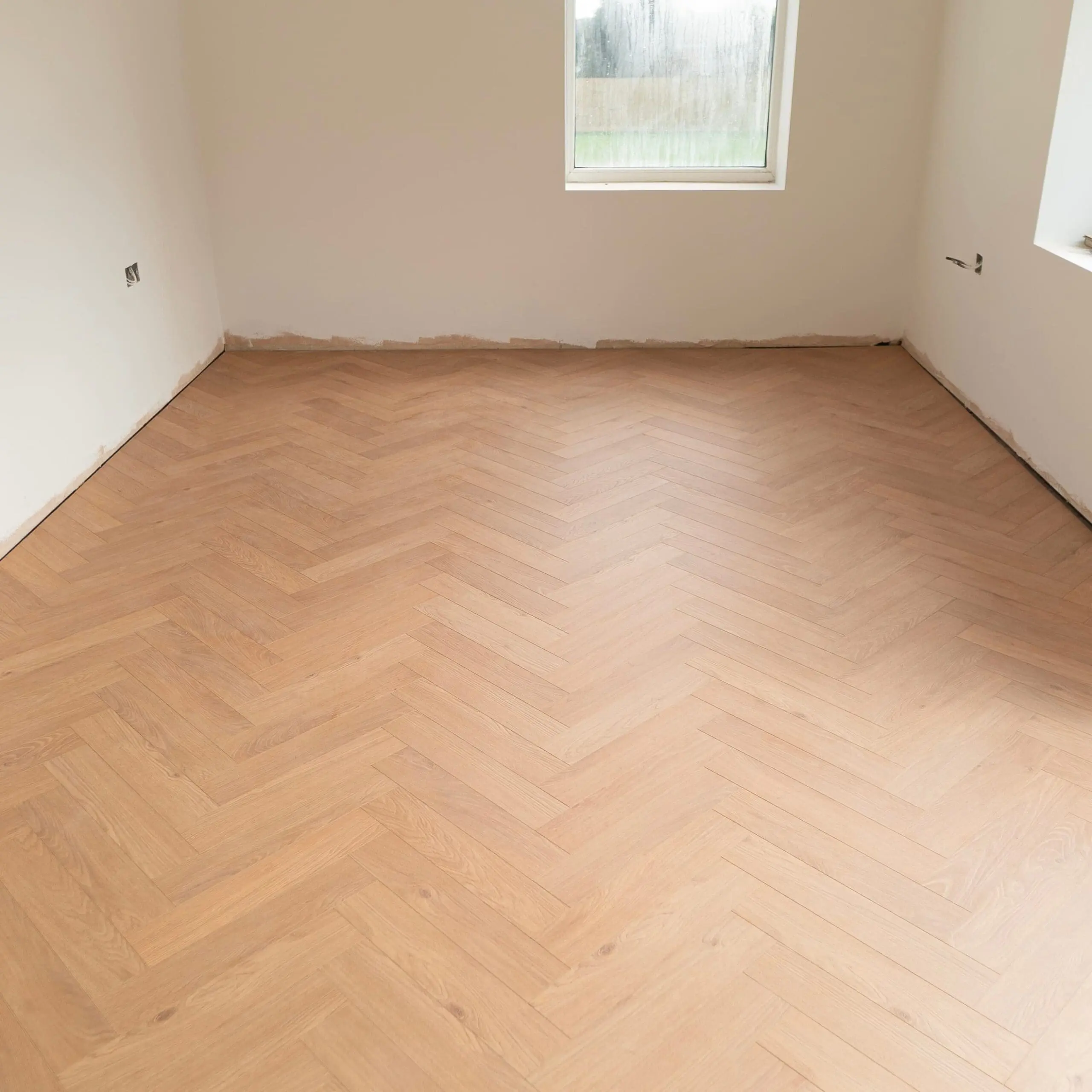 Craft 12mm Sunset Oak Herringbone AC5 Laminate Flooring