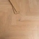 Craft 12mm Sunset Oak Herringbone AC5 Laminate Flooring