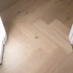 Riviera Prime Click 14/3 x 150mm Pale Invisible Oak Herringbone Engineered Wood Flooring