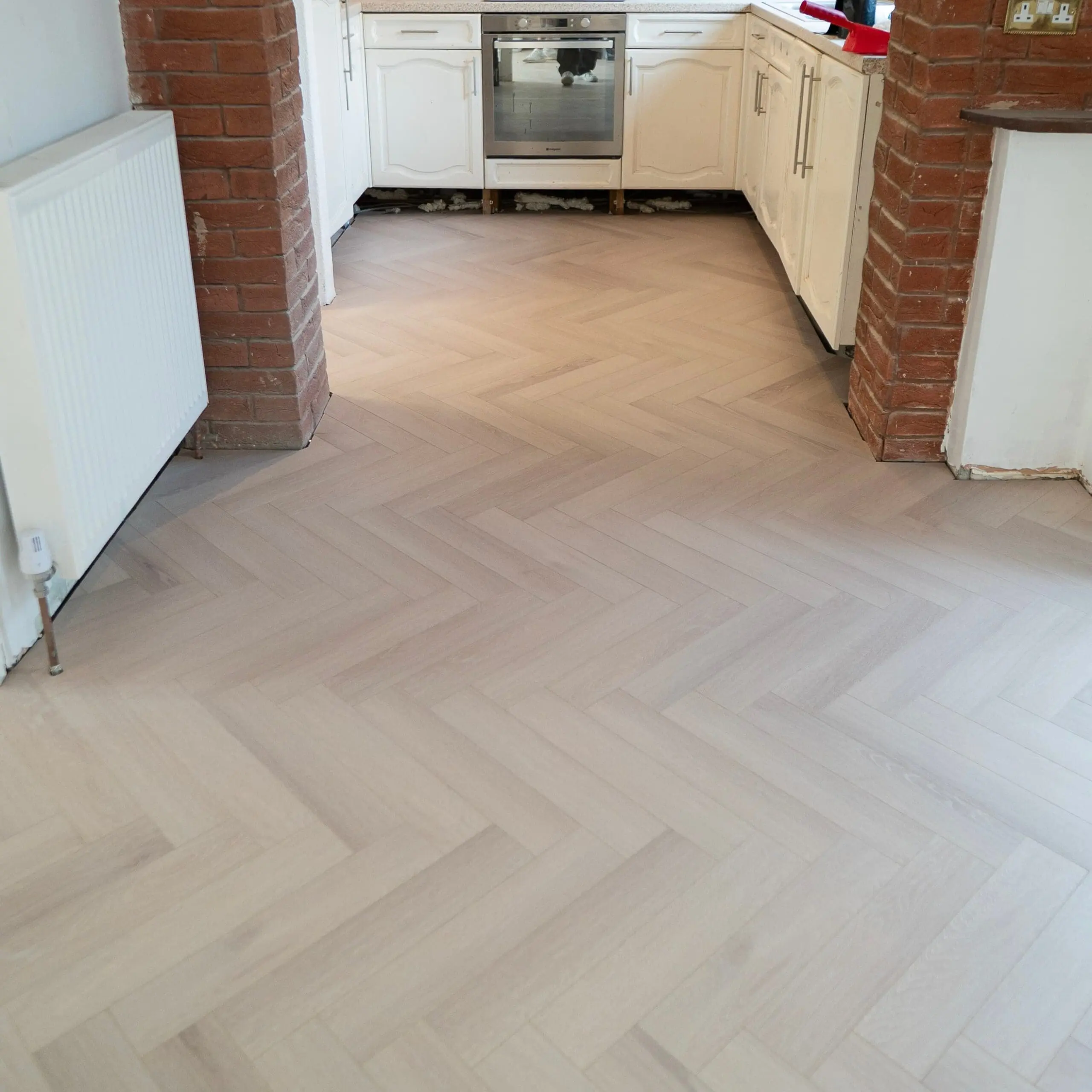 Craft 12mm Coral Oak Herringbone AC5 Laminate Flooring
