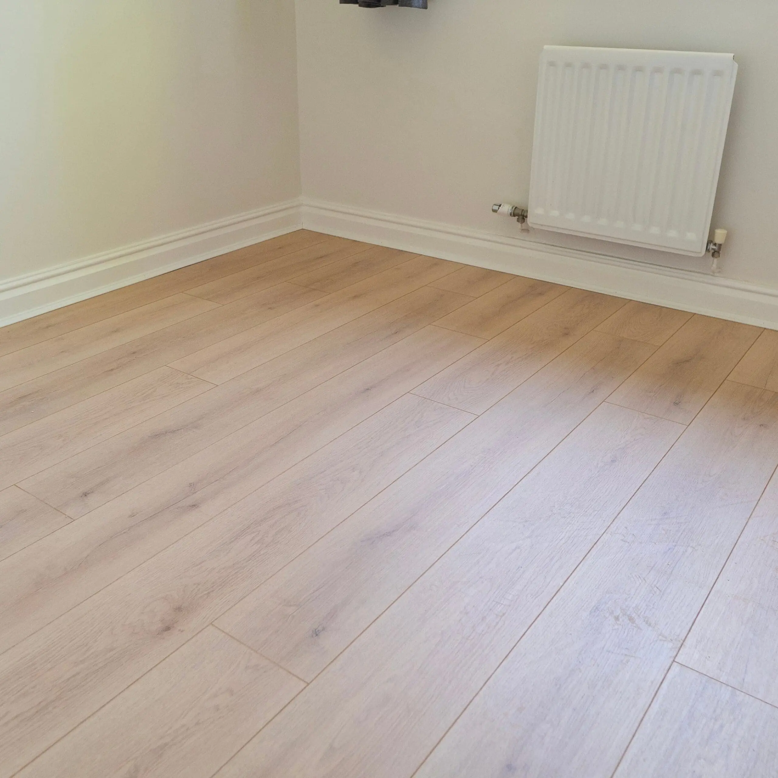 Premium 12mm Light Beige Oak AC5 Laminate Flooring