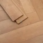 Flair 12mm Biscoff Oak Herringbone Laminate Flooring