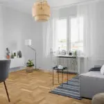 Natural Oak Heritage Herringbone flooring with a lacquered finish, offering timeless style and lasting durability.