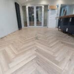 Greige Oak Herringbone Laminate Floor