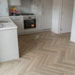Lignum 12mm Fusion Greige Oak Herringbone Laminate Flooring